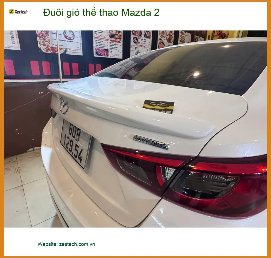 Anh Trọng độ đuôi gió thể thao Mazda 2 tại Quận Gò Vấp để xe trông mạnh mẽ hơn ảnh thực tế 2