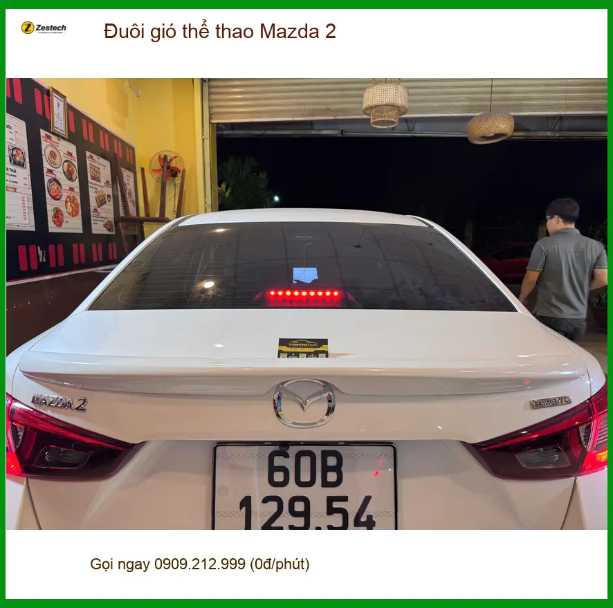 Anh Trọng độ đuôi gió thể thao Mazda 2 tại Quận Gò Vấp để xe trông mạnh mẽ hơn ảnh thực tế 3