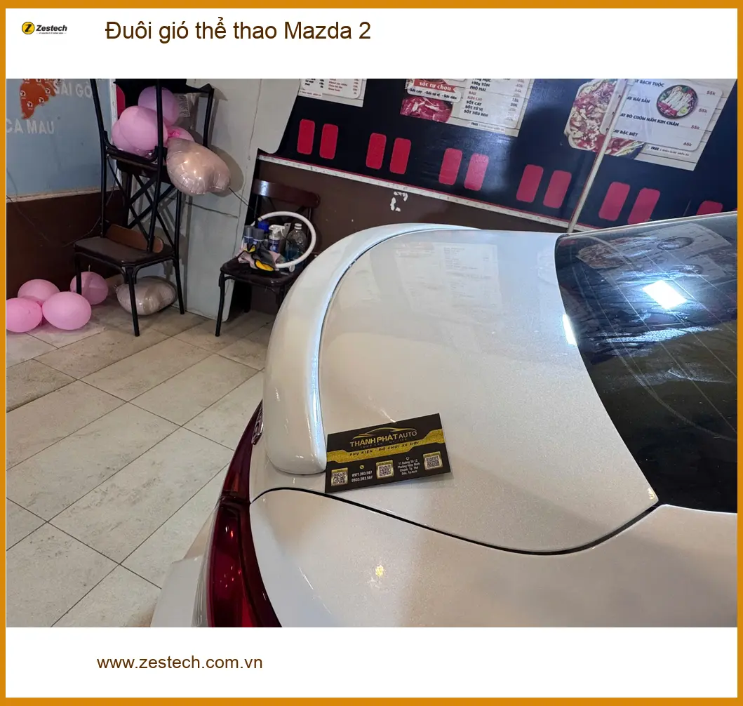 Anh Trọng độ đuôi gió thể thao Mazda 2 tại Quận Gò Vấp để xe trông mạnh mẽ hơn ảnh thực tế 4