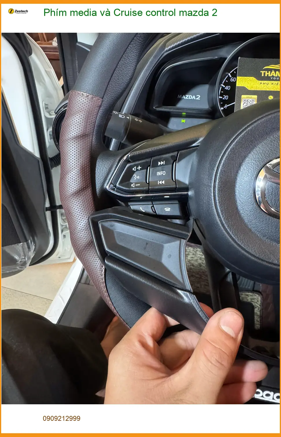 Chị Thảo nâng cấp Phím media và Cruise control Mazda 2 Quận Tân Phú để lái xe tiện lợi