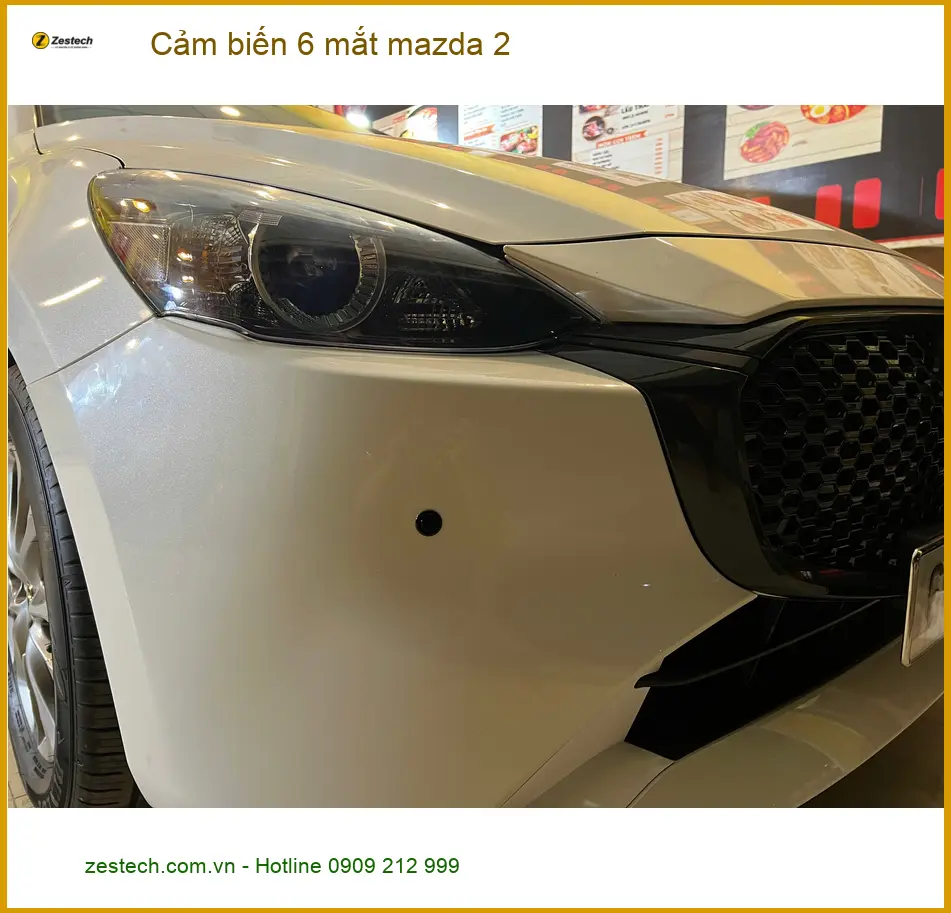Anh Kiên lắp cảm biến 6 mắt Mazda 2 tại Quận 11 để lùi xe dễ dàng hơn