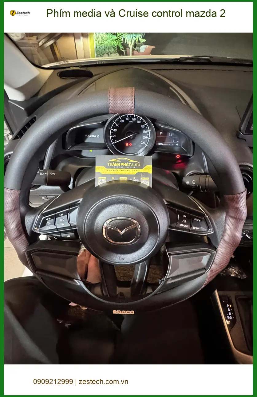 Chị Vân lắp Phím media và Cruise control Mazda 2 Quận 10 tiện lợi