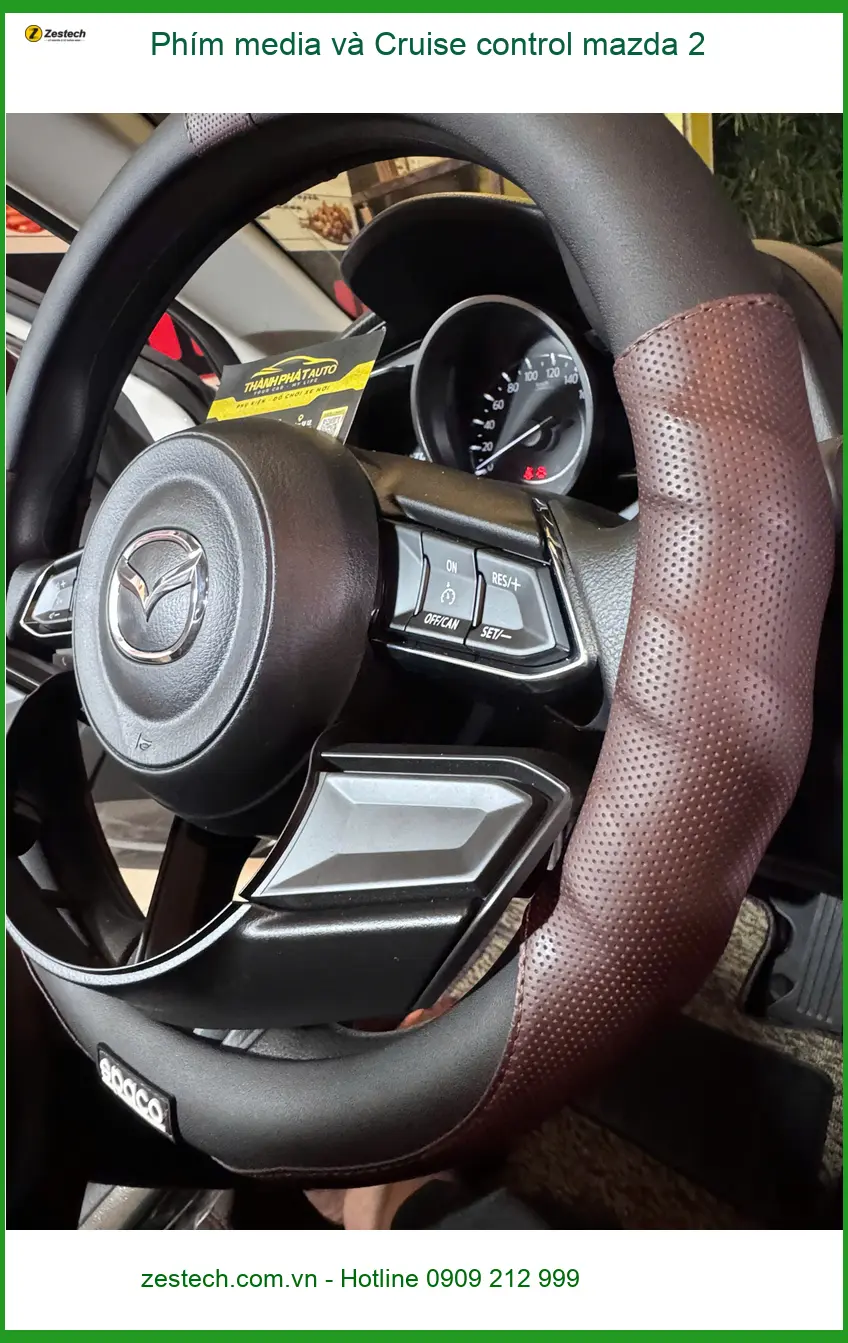 Anh Lâm lắp phím media và Cruise control cho Mazda 2 tại Quận 11 để lái xe tiện lợi hơn ảnh thực tế 3